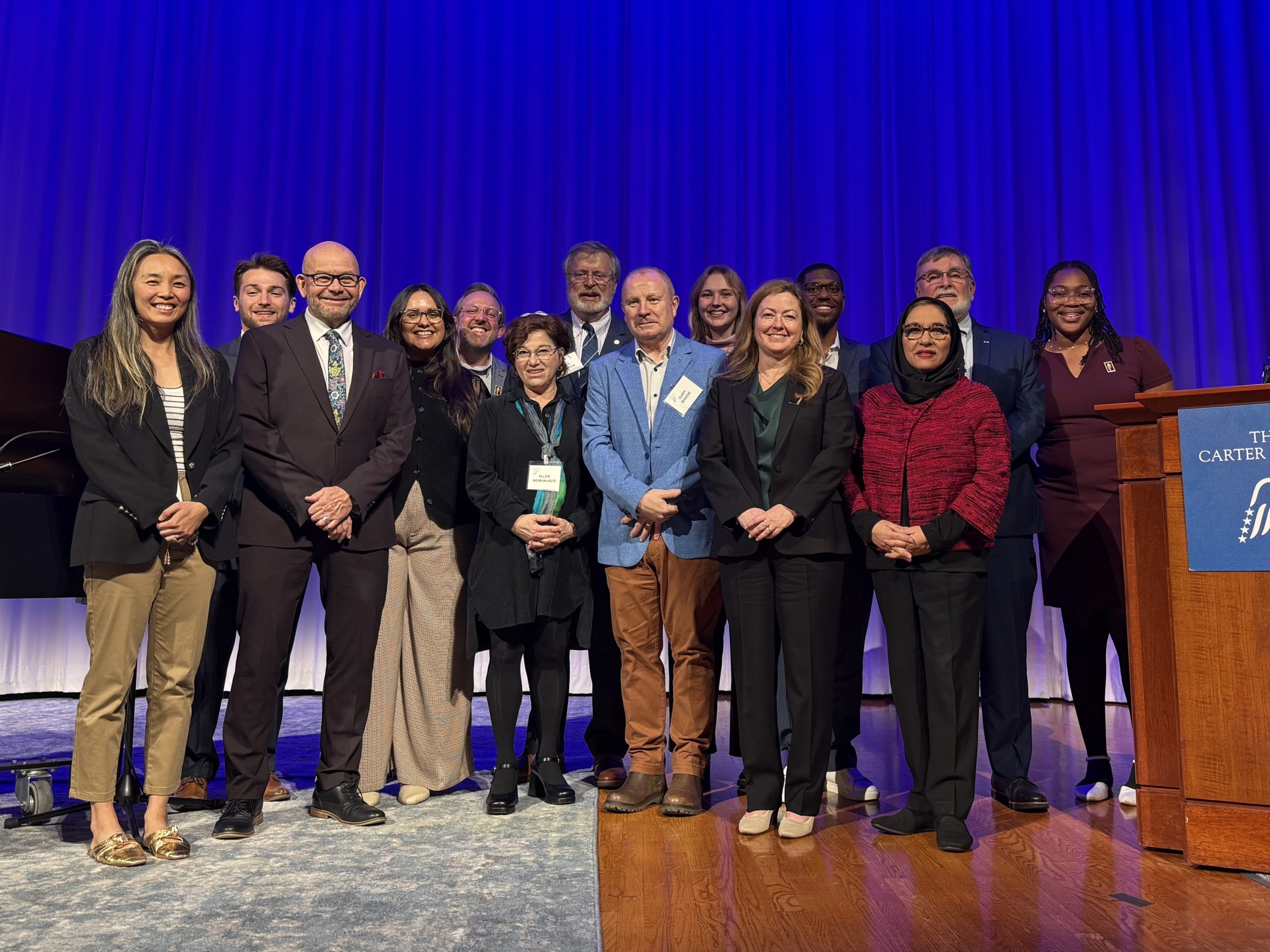 Speakers above: Paa Coss, Rev. Dr. Randy Rainwater, Jasmin Sosa, Andrew Greer, Rabbi Ellen Nemhauser, Don Balfour, Rev. Dr. Gary Mason, Barbara J. Smith, Laurence Steven Minter, Soumaya Khalifa. Photo: Carter Center/H. Steed